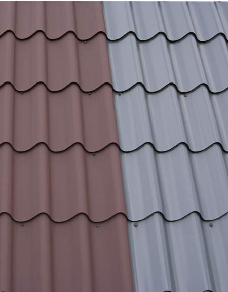 metal-roof Close-up of durable metal roofing panels in two colors, one a terracotta brown and the other a light gray, featuring a wave-like profile.