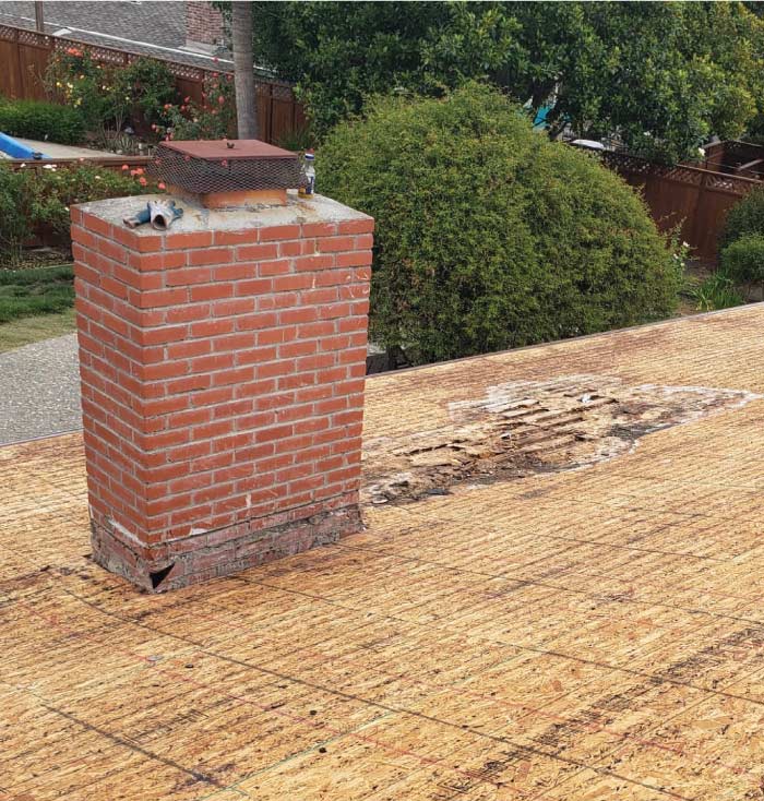 Close-up of damaged dry rot repair roofing in antioch, ca