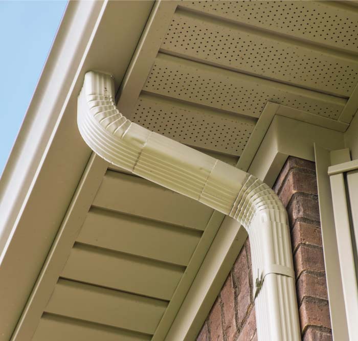 beige modern gutter and downspout